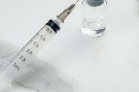 Immunization concept, rapid Covid test, mask, vaccine and rapid test.の写真素材