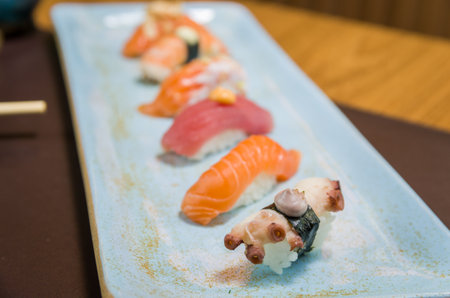 Combined of differents premium japanese sushi ( niguiri) on an elegant plate.の写真素材