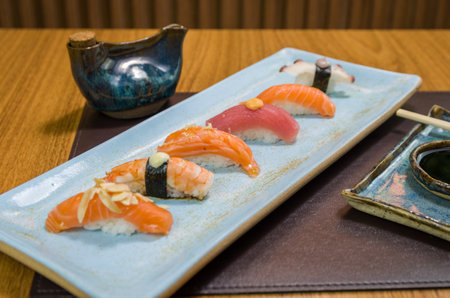 Combined of differents premium japanese sushi ( niguiri) on an elegant plate.の写真素材