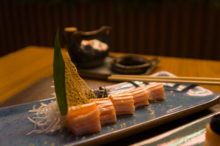 Combined of differents japanese sushi on an elegant blue plate.の写真素材