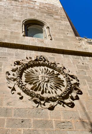 Almeria Cathedral, Spain. High on the wall is a sun emblem, known by locals as the Sol de Portocarrero. It is the symbol of city of Almeria.の写真素材