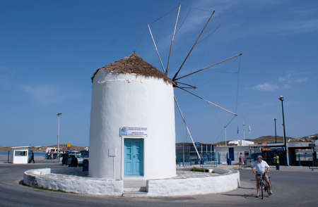 Paros island - Greece - May 13 2010 : Traditional Greek island windmill at the ferry dock on this charming island  Landscape aspect view  Blue sky and copy spaceのeditorial素材