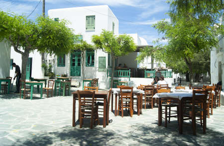 Folegandros island - Greece -  May 5 2012 : Beautiful secluded square with traditional Greek tavernas.  Typical village scene in the heart of the old town.のeditorial素材
