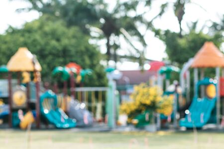 Defocused and blurred image for background. Blur colorful playground in nature green park abstract background. Copy space of sport exercise and health care concept.in thailand. bokeh.の写真素材