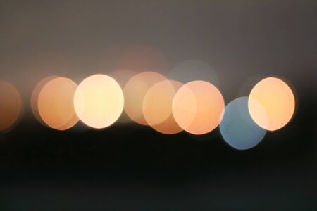 Red and orange,yellow Bokeh circles for background,, glitter light Defocused and Blurred Bokeh, Colorful.の写真素材