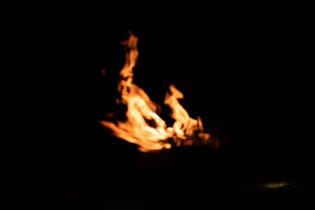 Defocused and blurred image for background. Red orange flame from the fire on the pan roasting cashews.
fire,heat energy that ignites fuel at night
black background. select focus.の写真素材