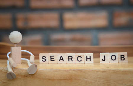 Dice the word "SEARCH JOB". Text dice cube concept / Letter dices alphabet on wooden background. Block of alphabet studded on the floor. search jobs. coppy space.の写真素材
