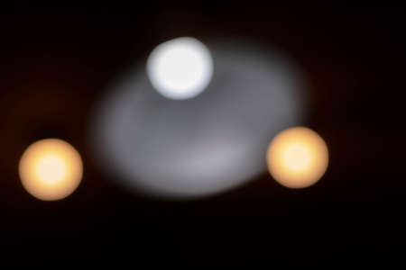 abstract blur of interior inside coffee cafe shop background with light effect for design element....