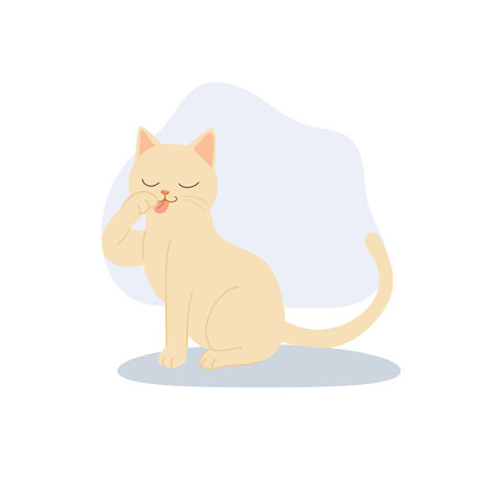 a cute beige cat licking its paw at home, showing calm grooming behavior in a minimalist flat design style suitable for pet and lifestyle conceptsのイラスト素材