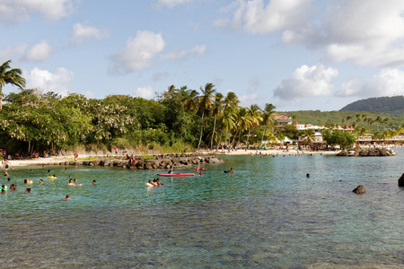 29-JUL-2018 La Pointe du Bout, Les Trois Ilets, Martinique, FWI - Sunday at the beachのeditorial素材