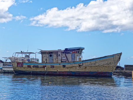 Old fishermen boat in Case-Pilote harbor - Martinique, FWIの写真素材