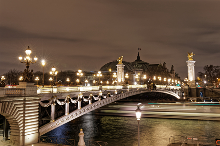 Night view of Alexandre III bridge on the Seine - Paris, Franceの写真素材