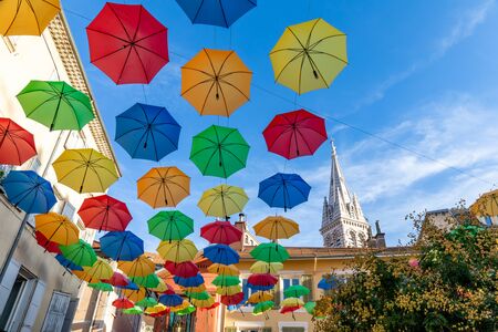 16 AUG 2019 - Gap, Hautes-Alpes, France - Colored umbrellasの写真素材