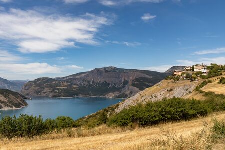 Lake Serre-Poncon, Alps, France - Le Sauzet villageの写真素材