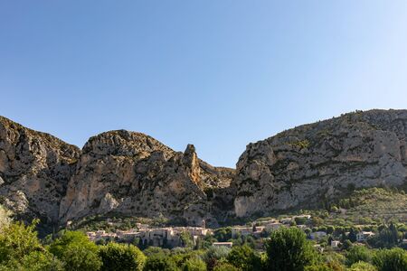 Moustiers Sainte Marie, Alps, France - The village under the rocksの写真素材