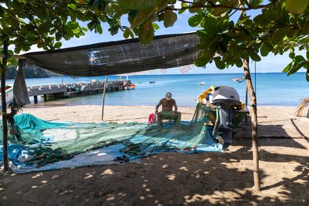 Saint Lucia, West Indies - Fisherman at Anse La Raye beachの写真素材