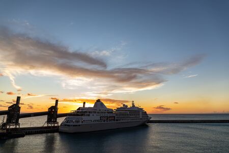 07 JAN 2020 - Cruise Ship at the sunset in Bridgetown Harbor, Barbadosの写真素材