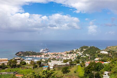 09 JAN 2020 - St George's, Grenada, West Indies - Cruise ship in front of the city of St. George'sの写真素材