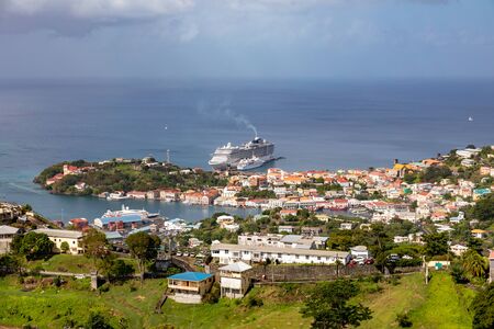 09 JAN 2020 - St George's, Grenada, West Indies - Cruise ship in front of the city of St. George'sの写真素材