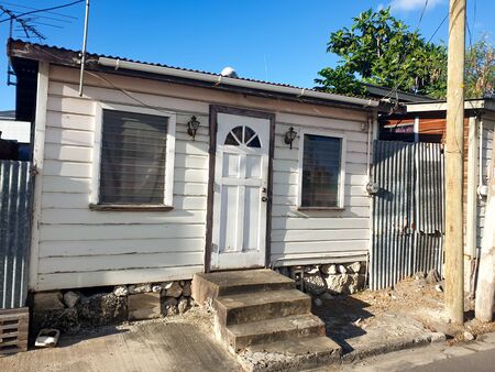Bridgetown, Barbados - A simple small wooden house in Bridgetownの写真素材