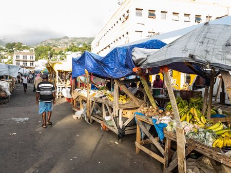 10 JAN 2020 - Kingstown, Saint Vincent and the Grenadines - Market vendors in the streetのeditorial素材