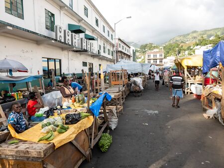 10 JAN 2020 - Kingstown, Saint Vincent and the Grenadines - Market vendors in the streetのeditorial素材
