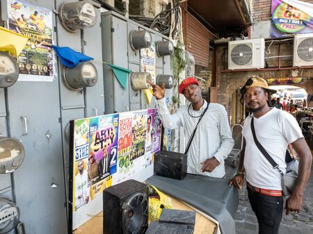 10 JAN 2020 - Kingstown, Saint Vincent and the Grenadines - Music vendors in the streetのeditorial素材