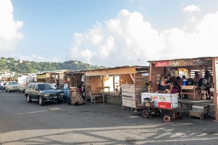 10 JAN 2020 - Kingstown, Saint Vincent and the Grenadines - Small bars in the waterfront streetのeditorial素材