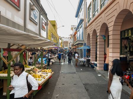 10 JAN 2020 - Kingstown, Saint Vincent and the Grenadines - Street vendors stalls in a shopping streetのeditorial素材