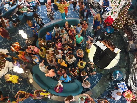 07 JAN 2020 - Cruise ship, Caribbean sea - People dancing in the main hall view from aboveのeditorial素材