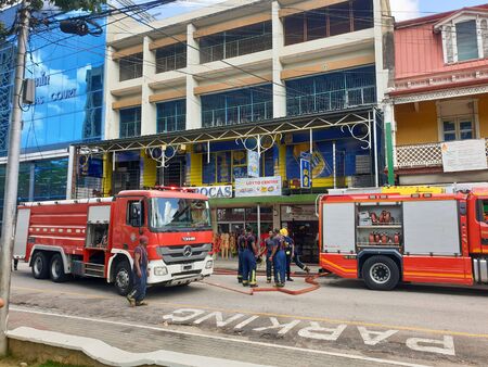 08 JAN 2020 - Port of Spain, Trinidad and Tobago - Firemen operating on a fire in independence squareのeditorial素材