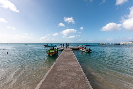 09 JAN 2020 - The Lime, Grenada, West Indies - Grande Anse beach pontoonのeditorial素材
