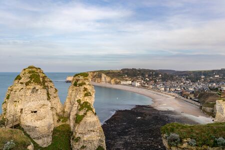 Etretat, Normandy, France - The seafront and the beach at low tide, view to the north ('Amont' cliff)の写真素材