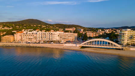 Aerial view of Sainte-Maxime seafront and its famous bridge in French Riviera (South of France)の写真素材
