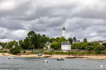 Benodet beach and lighthouse, Finistere, Brittany, Franceのeditorial素材