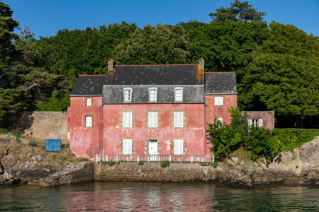 The pink house, famous landmark in the entrance of Vannes Harbor, Gulf of Morbihan, Brittany, Franceのeditorial素材