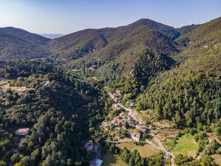 Aerial view of the village of Soudorgues in the Cevennes mountains (South of Massif Central, France)の写真素材