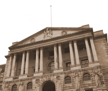 The exterior of the Bank of England in Threadneedle Street, London. A sepia tone has been added to the image for a vintage effect.のeditorial素材