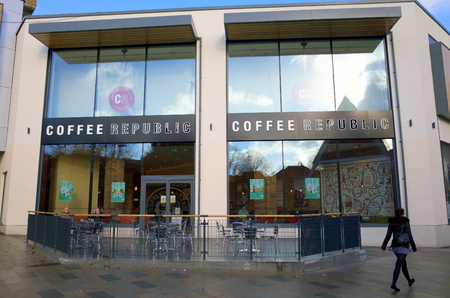 Bracknell, England - February 20, 2017: A pedestrian passes by the Coffee Republic shop in Bracknell,England. Started in 1995 they now have 28 stores across the UKのeditorial素材