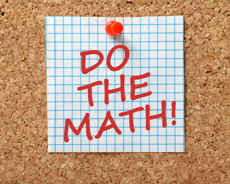 The words Do The Math in red text on a piece of squared graph paper pinned to a cork notice board as a reminder to make calculations when making decisionsの写真素材