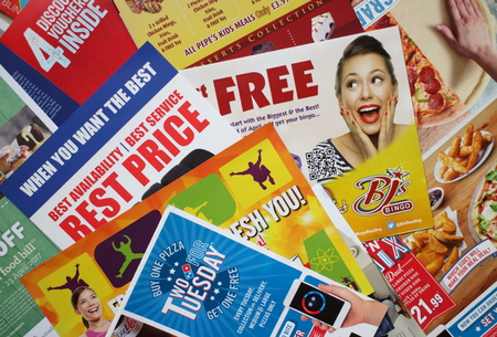 Bracknell, England - April 11, 2017: Sample of leaflets and brochures or Junk Mail delivered to a private address in Bracknell, England to advertise local retail and service businessesのeditorial素材