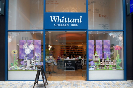 Bracknell, England - April 12, 2018: Exterior of Whittard of Chelsea with a member of staff visible inside the store in Bracknell, England. Whittard started selling tea and coffee in London in 1886のeditorial素材