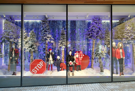 Bracknell, England - December 04, 2018: Winter clothing in the Christmas season, window display of Fenwick department store in Bracknell, Englandのeditorial素材