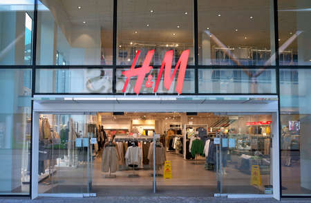 Bracknell, England - February 26, 2020: Entrance to the H&M fashion clothing and accessories store in Bracknell, Englandのeditorial素材
