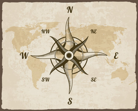 Retro nautical compass. Hand drawn wind rose on map background. Old vector design element for marine theme and heraldry. Vintage rose of wind for sea marine navigationのイラスト素材