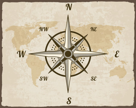Retro nautical compass. Hand drawn wind rose on map background. Old vector design element for marine theme and heraldry. Vintage rose of wind for sea marine navigationのイラスト素材