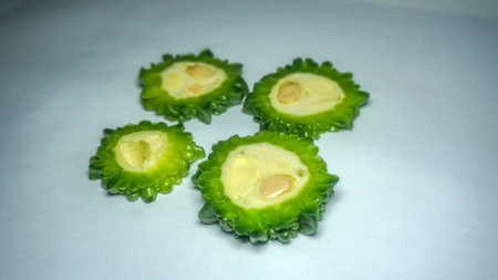 Fresh bitter melon on white. Healthy bitter melon for human body.の写真素材