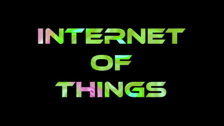 Internet of Things text on black background. Multicolored glossy technological word written on black.の写真素材