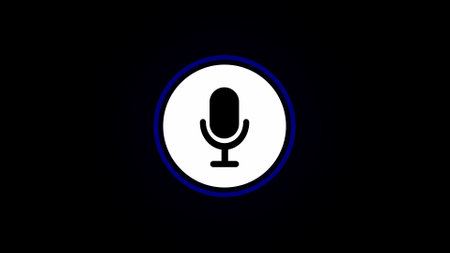 White color microphone icon on the counter. black color background.の写真素材
