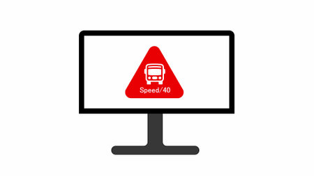 Computer monitor displaying a red triangular warning sign with a bus symbol and speed limit of 40 on...